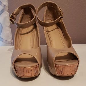Nude patten leather peep toe wedges